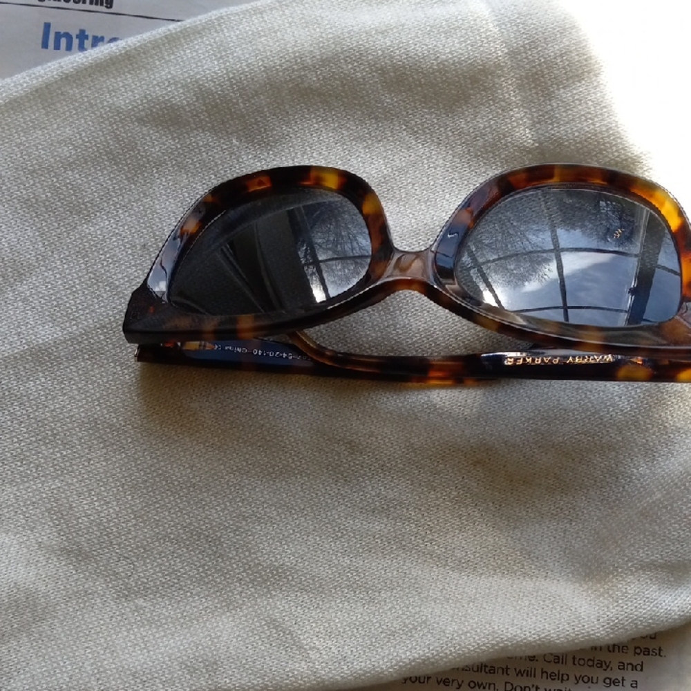 Warby Parker Women’s Tortoiseshell Round Sunglasses with Dark Lenses